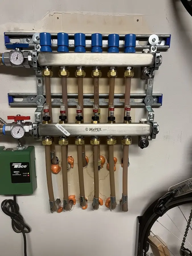 Plumber performing Water Heater Repair at a residential property in Lower Makefield